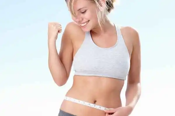 woman happy after fat reduction treatment Malmesbury
