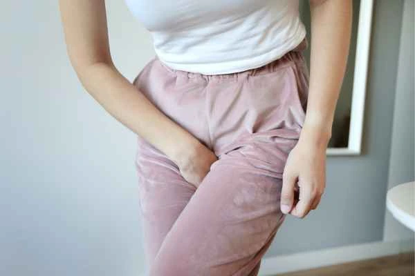 older woman running to the toilet because of urinary incontinence Malmesbury